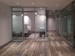 Beautiful glass office with hardwood floors