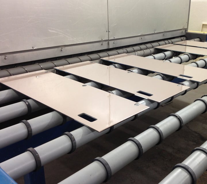 Glass locker doors on assembly line in factory