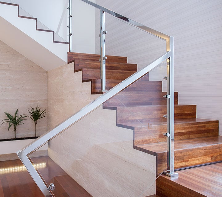 Glass railing on beautiful staircase in modern home