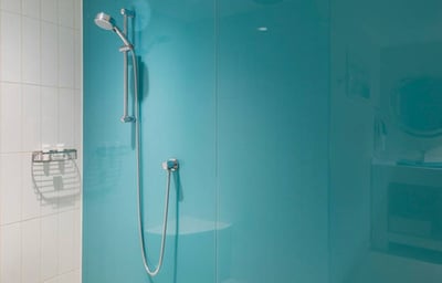 Turquoise Back Painted Glass in Shower