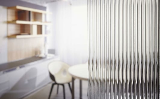 Reeded Glass in focus with room blurred in background