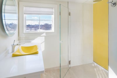 Decorative Glass in Bathroom - Yellow glass on sink and shower wall