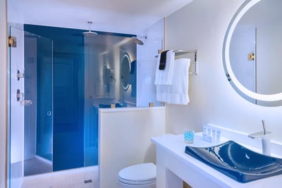Blue back painted glass in shower