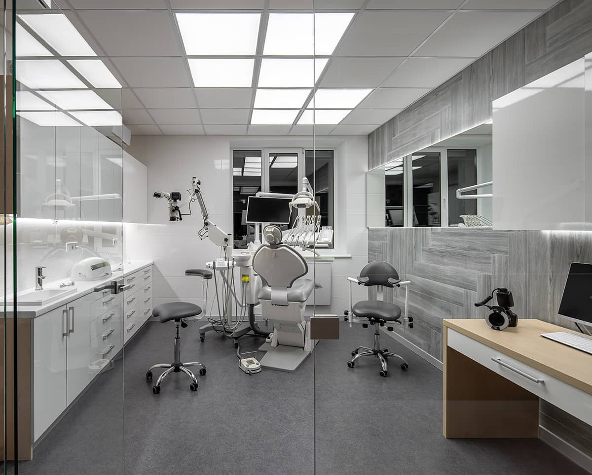 Modern dental office with glass walls and doors