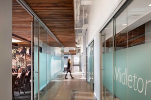 Office Space with Logo on frosted glass walls