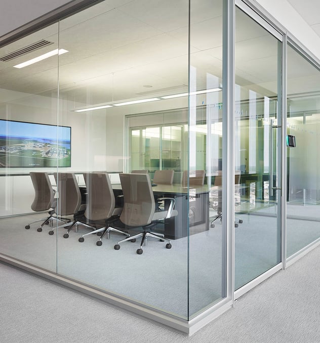 Sound-proof conference room with floor to ceiling glass windows
